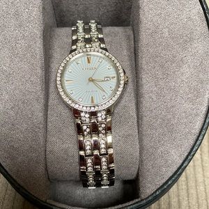 Citizen Silhouette Crystal two-tone stainless steel crystals and date feature.